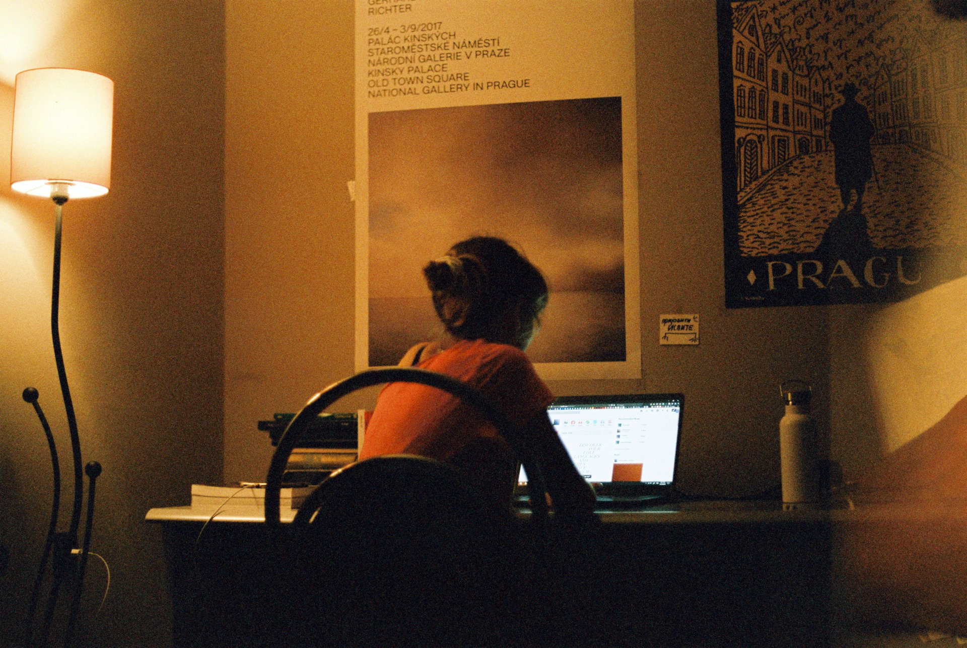 Person studying in a dimly lit room